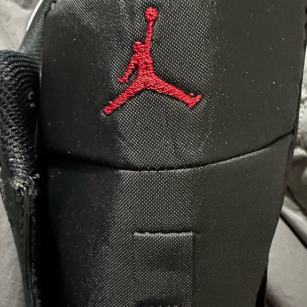 Jordan Air 1 Low in White, Black, and Red - Picture 10 of 14
